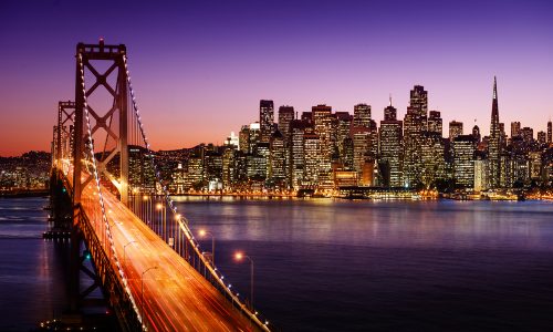 San,Francisco,Skyline,And,Bay,Bridge,At,Sunset,,California